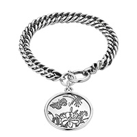 Серебряный шарм-браслет Gucci Flora с гравированной круглой подвеской, фото