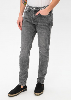Серые джинсы Calvin Klein с логотипом на поясе, фото